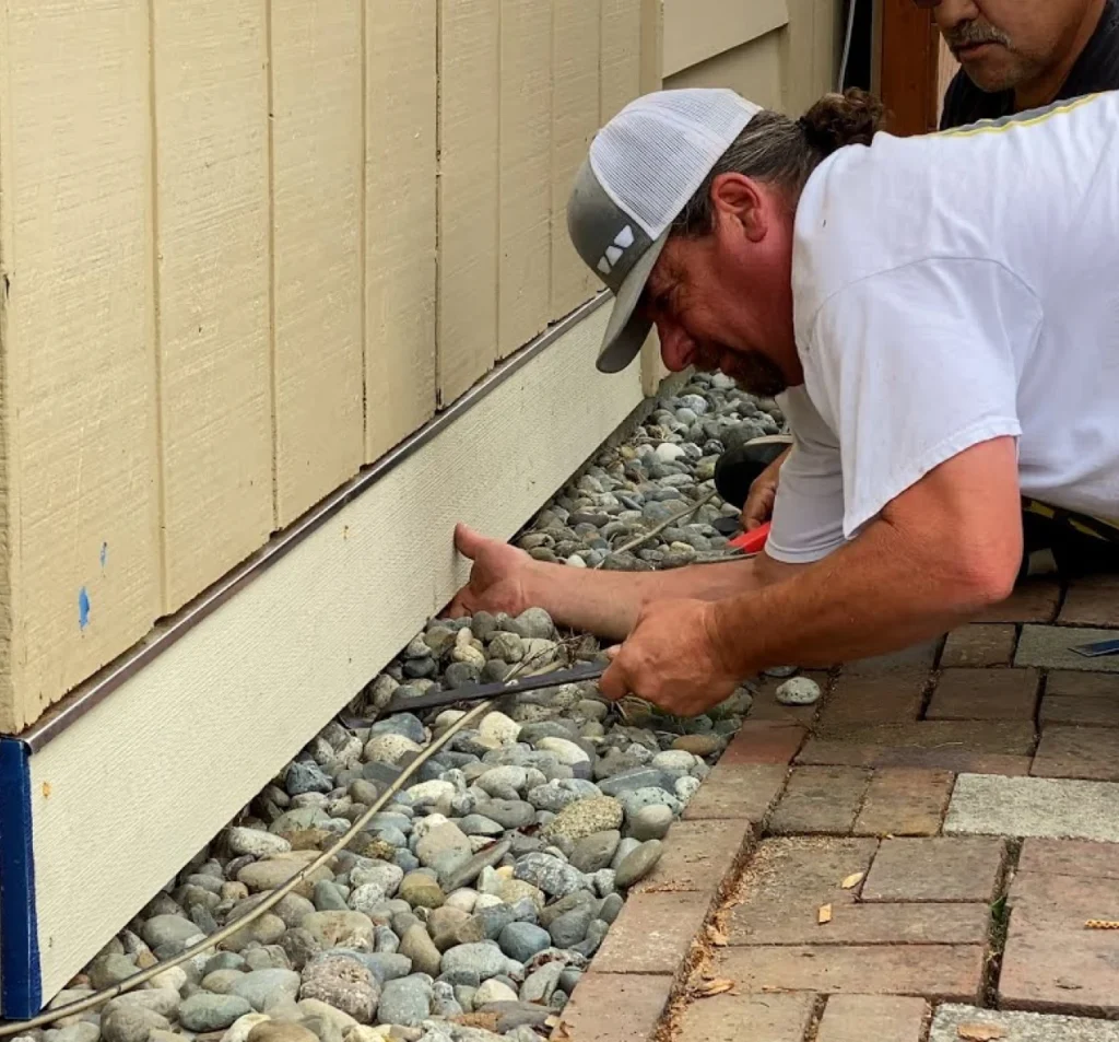 Damaged band board being repaired beneath a home in Fort Mill, SC