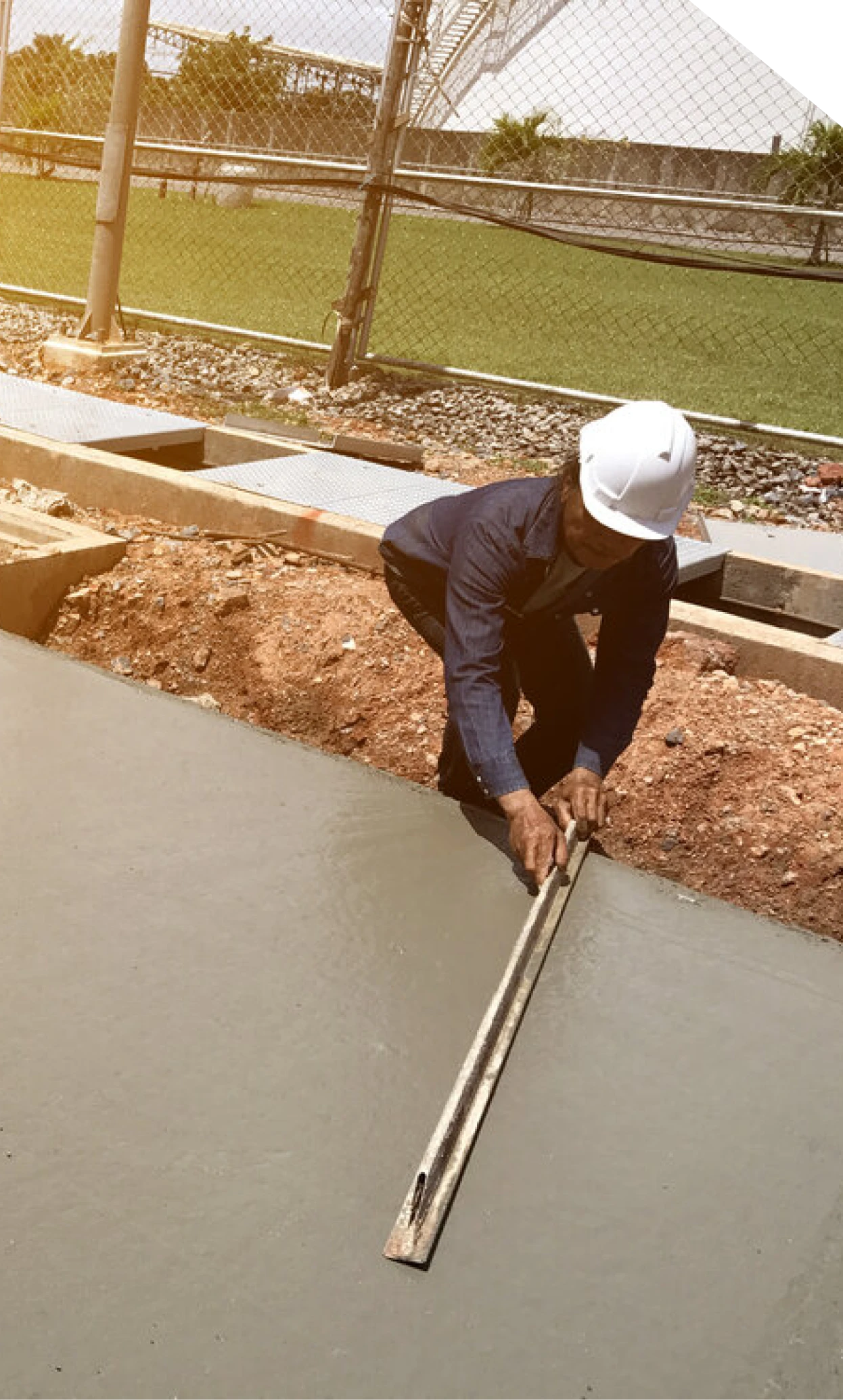 Contractor leveling a fresh concrete slab in Fort Mill, SC