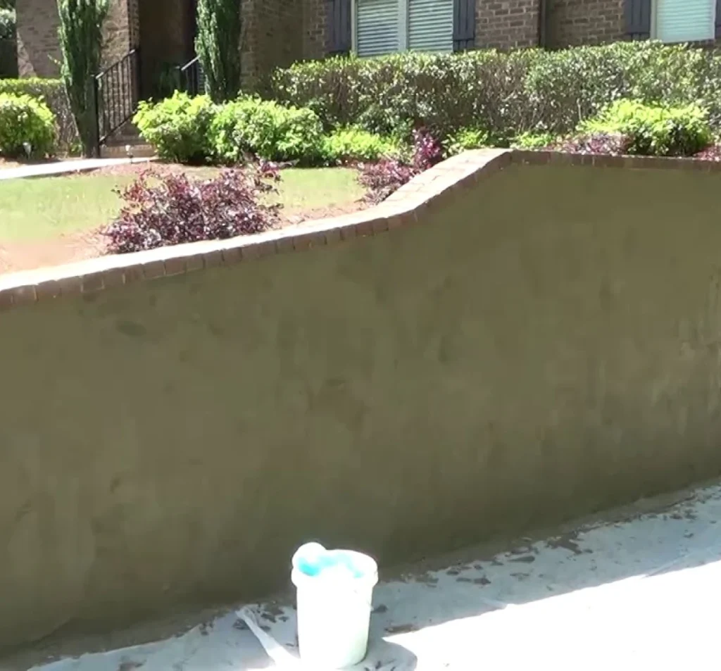 Large vertical crack in a concrete block retaining wall in Fort Mill, SC