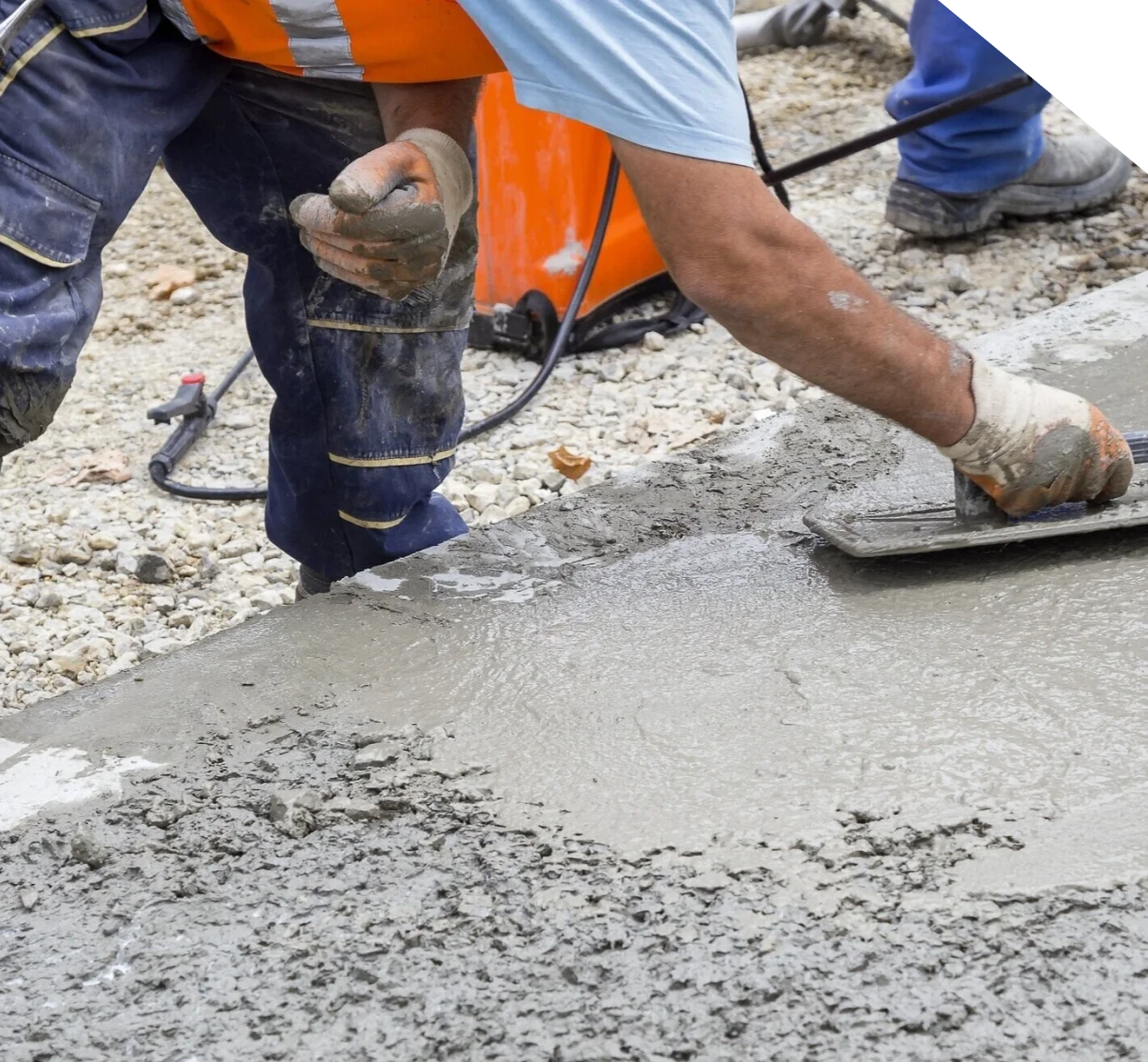 Workers smoothing and leveling freshly poured concrete in Fort Mill, SC