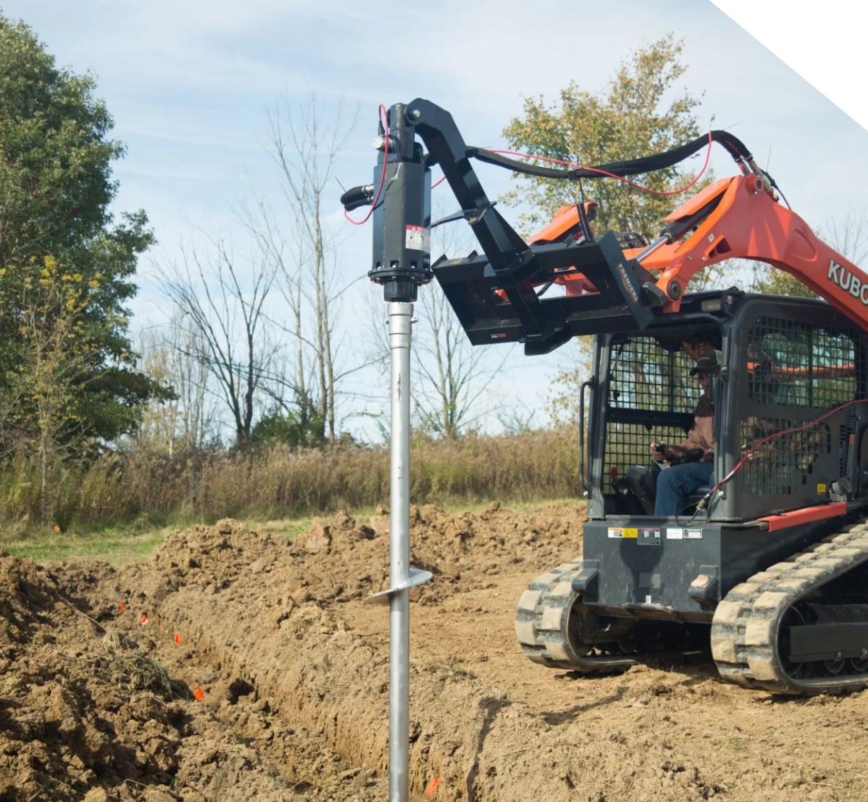 Equipment installing a helical pier for crawl space foundation repair in Fort Mill, NC