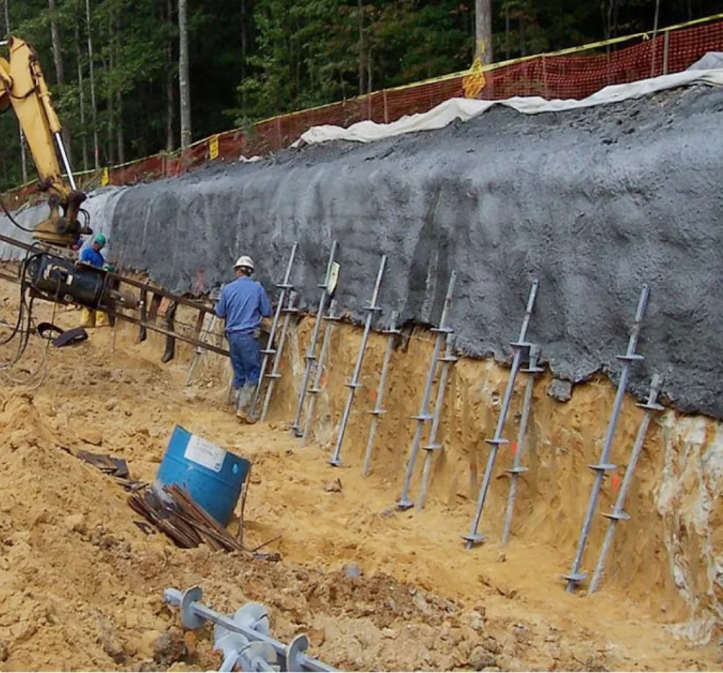 Workers installing soil anchors for foundation stabilization in Fort Mill, NC