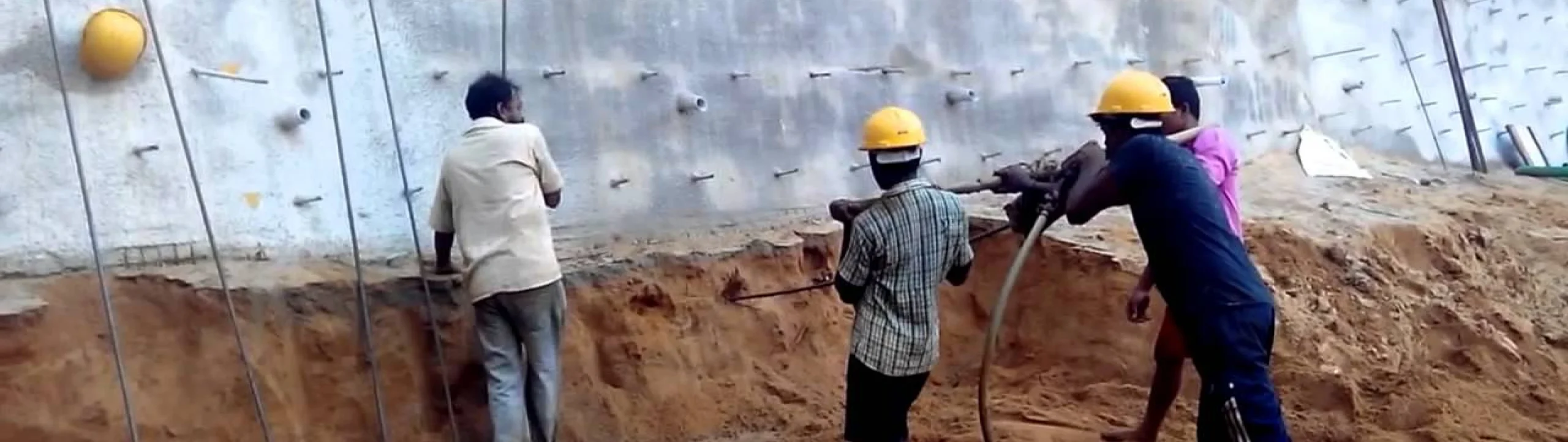Workers installing soil anchors for foundation stabilization in Fort Mill, SC
